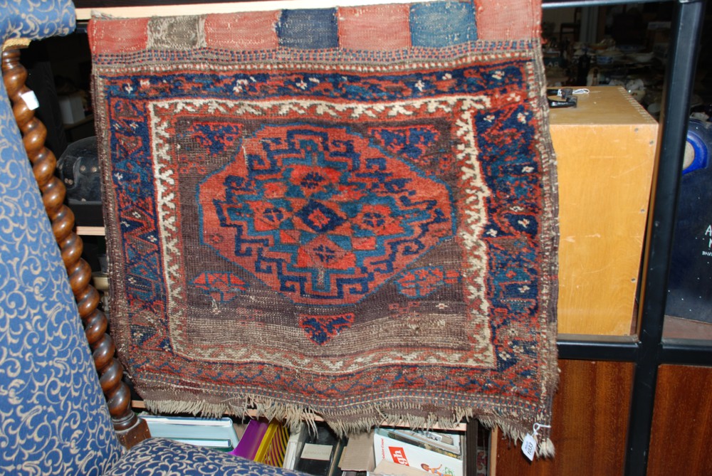 An antique hand knotted Belouch saddle-bag face