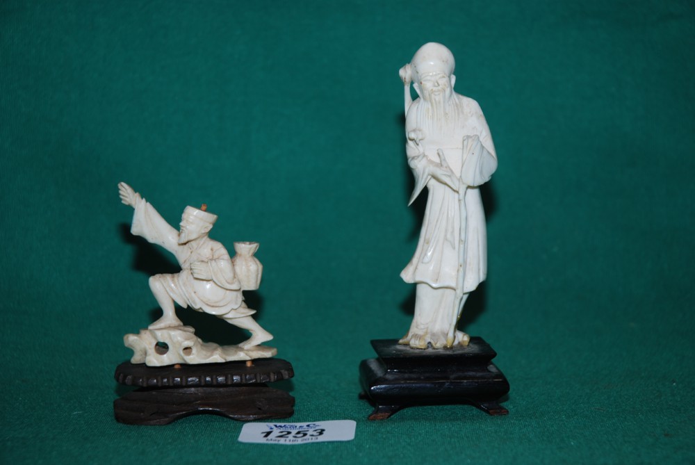 Two old Chinese Ivory figures, one of mandarin with stick, another of an old gent in striding pose