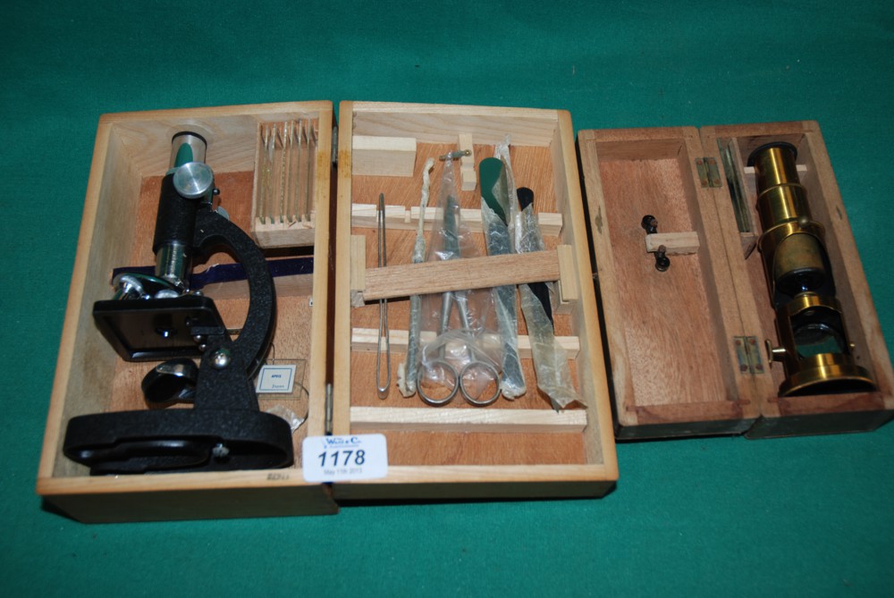 A small Brass field Microscope in wooden box and a ''Sky Bold'' Microscope with tools in wooden box