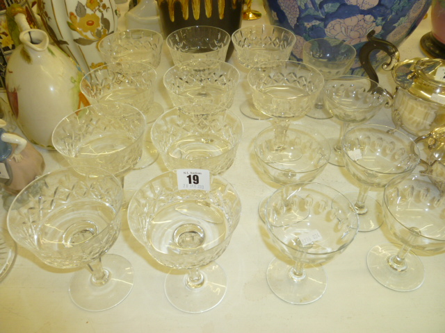 TWO SETS OF CHAMPAGNE GLASSES