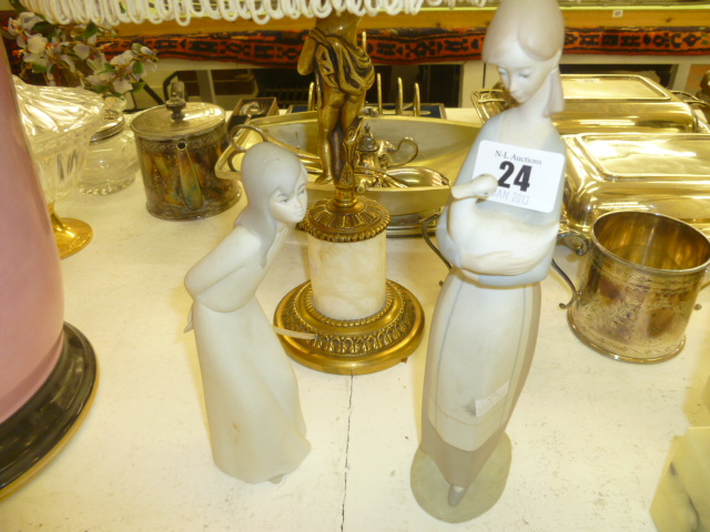 TWO FIGURINES