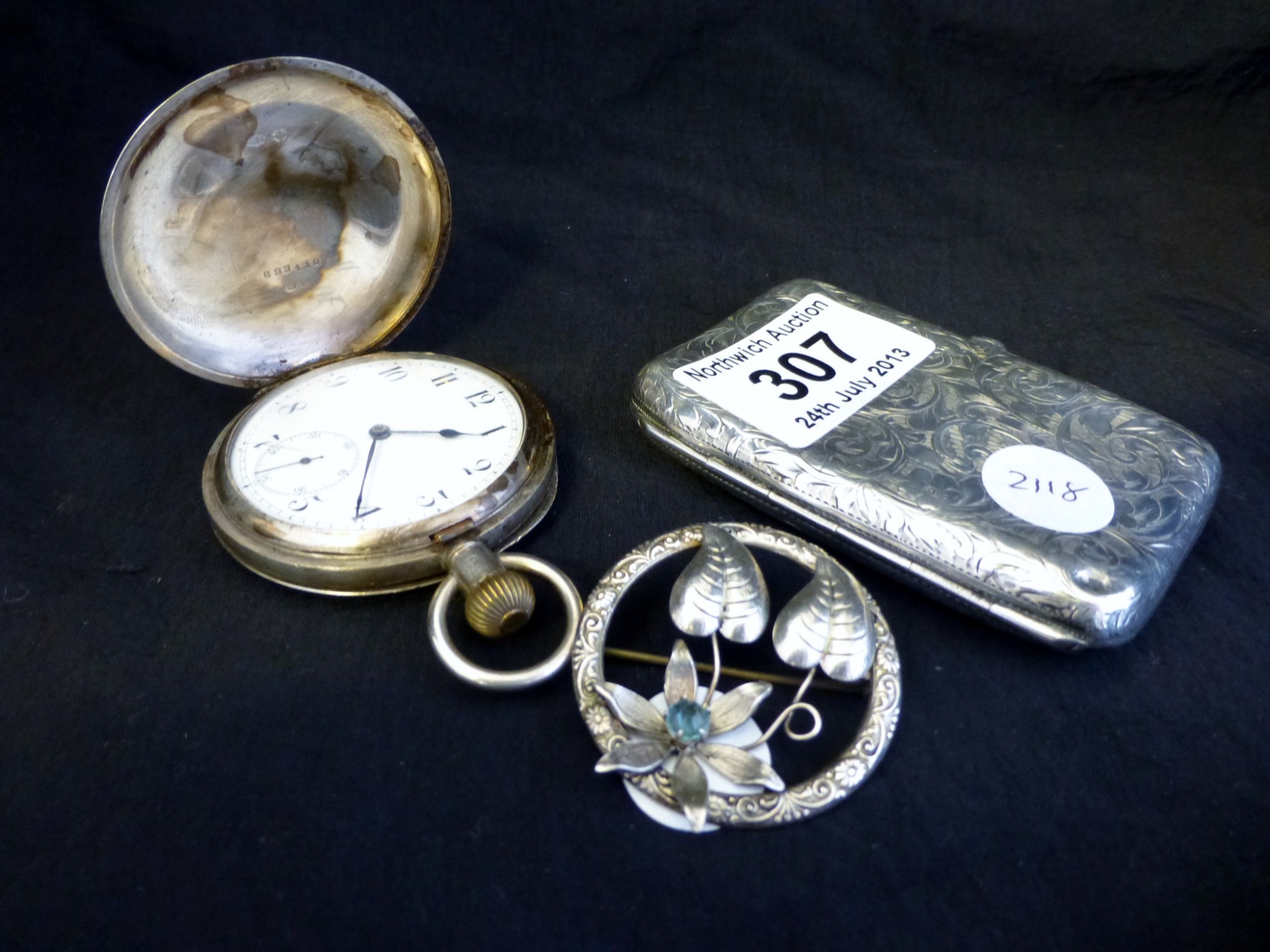 Sterling silver pocket watch, hallmarked silver cigarete case and silver brooch
