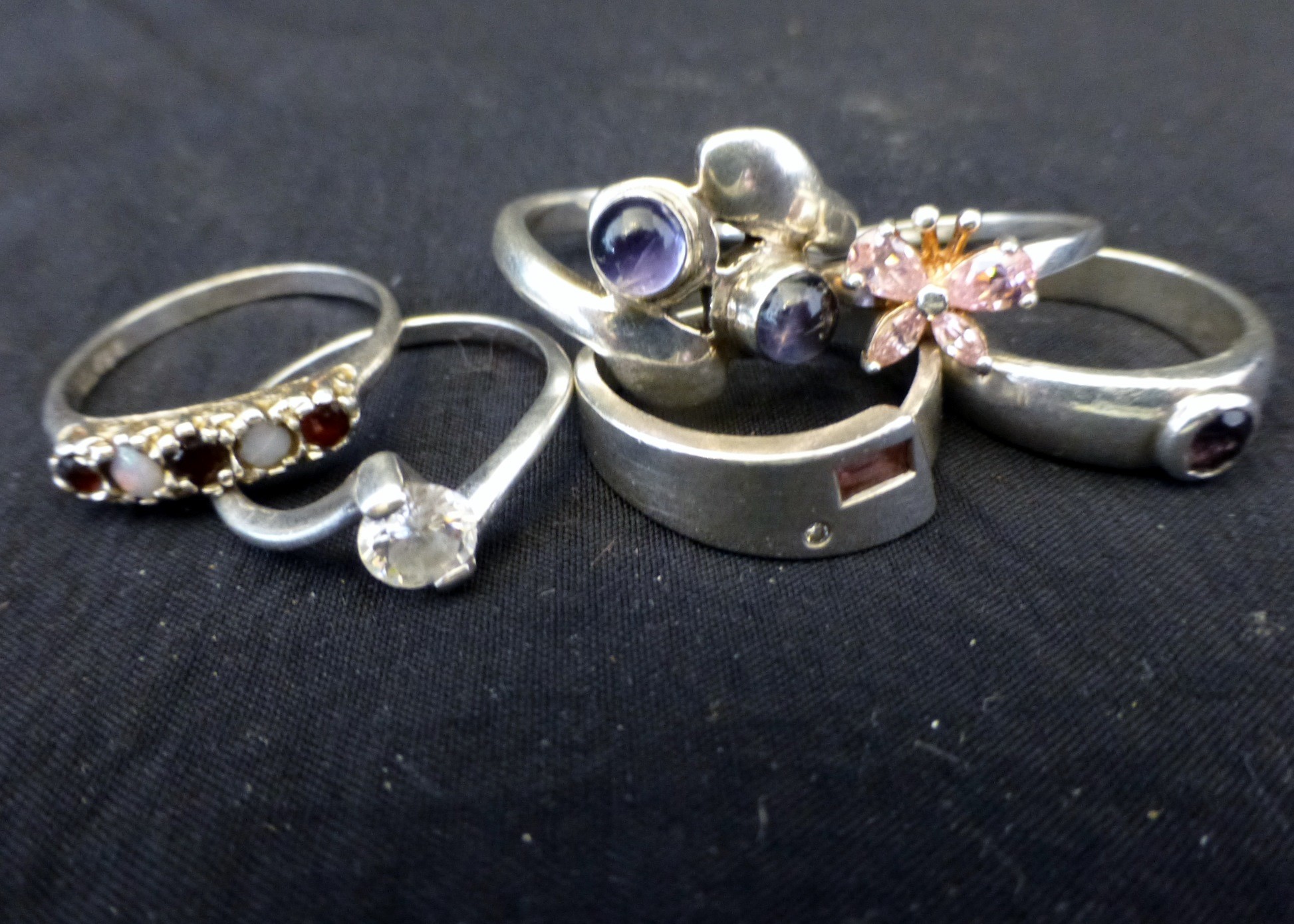 Six sterling silver rings