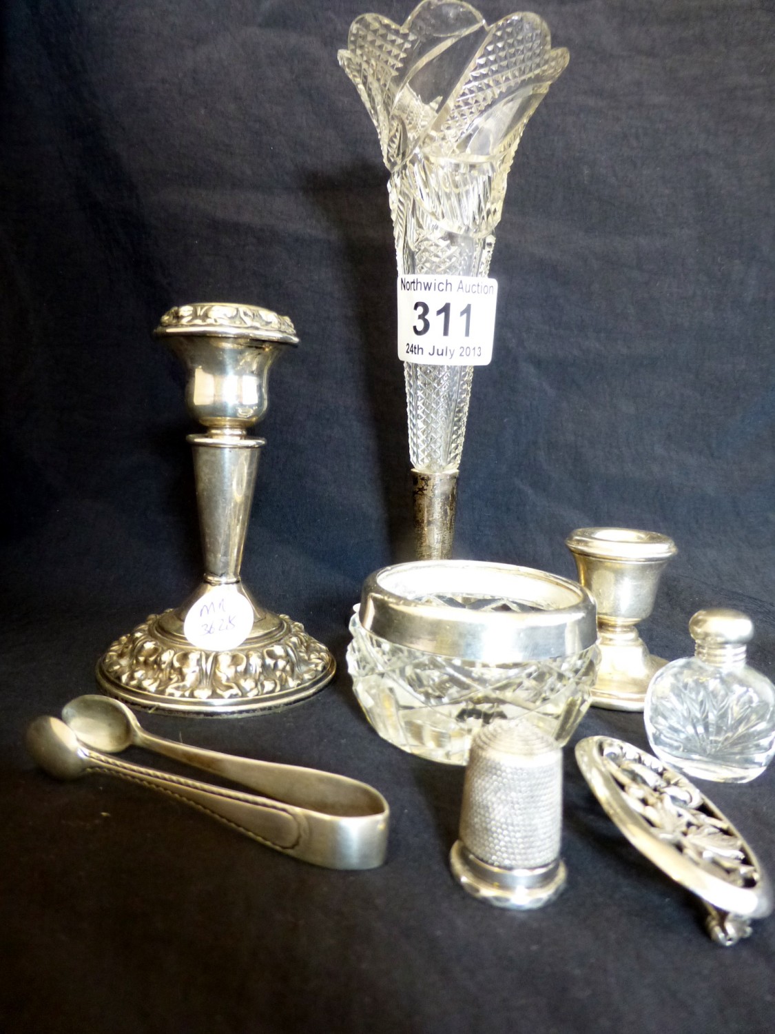 Quantity of hallmarked silver items including bud vase and candlesticks