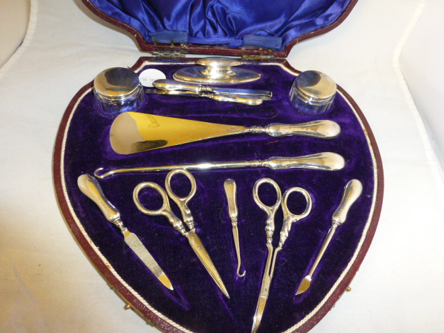 Boxed Edwardian twelve piece manicure set, silver 1910