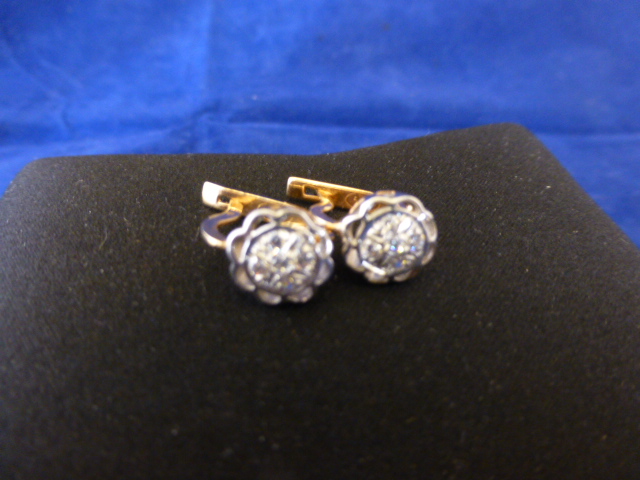 Pair of 18ct gold and diamond earrings, 3.2g