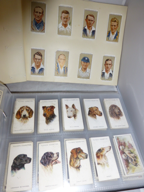 Two albums of cigarette cards