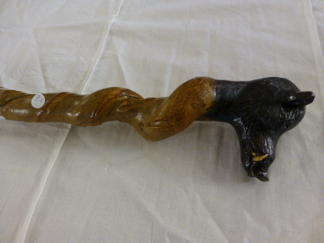 132cm walking stick with carved boars head handle and twisted hazel shaft