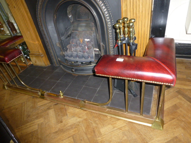 Brass fire seat with leather upholstered pads