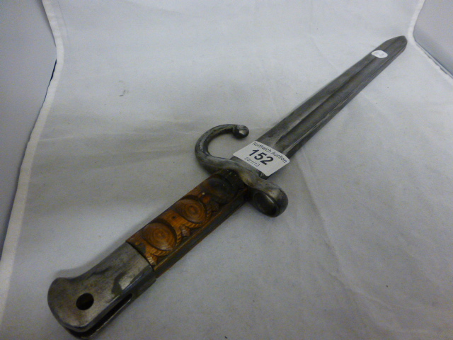 Bayonet with trench art to handle