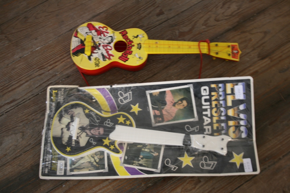 ELVIS PRESLEY - 2 x mini guitars to include 1 x Rock'n Roll 'Gitar' made by Selcol (UK) in red &