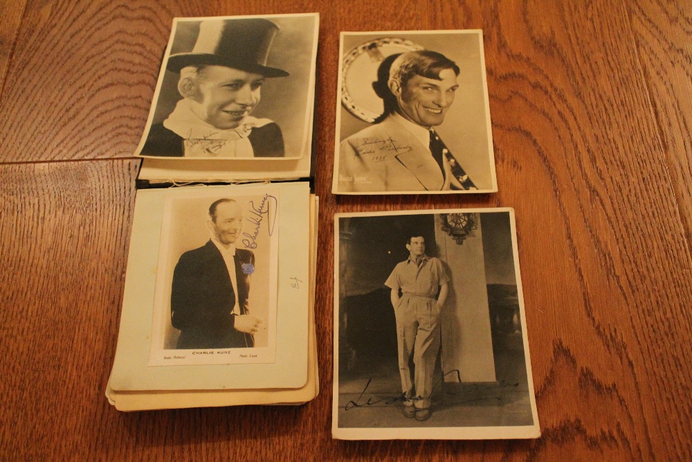 AUTOGRAPHS - small book containing autographed photographs of showbusiness personalities dating