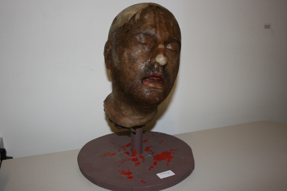 ELIZABETH (1998) - prop severed SFX head.  Realistically created from hardened resin with a skin-