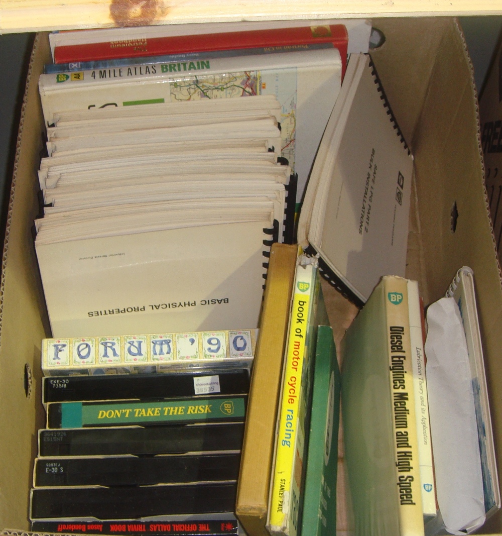 Box of BP and Shell PR videos, manuals and books and oil related memorabilia