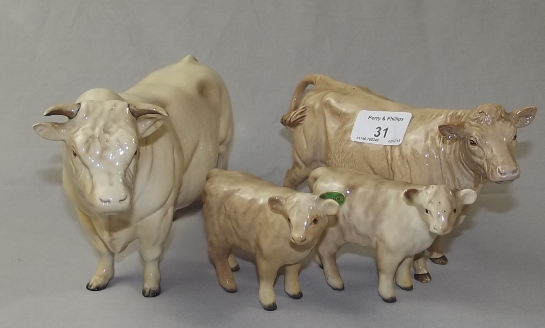 Beswick Charolais Bull, Cow and Two Calves models 2463, 3075, 1827