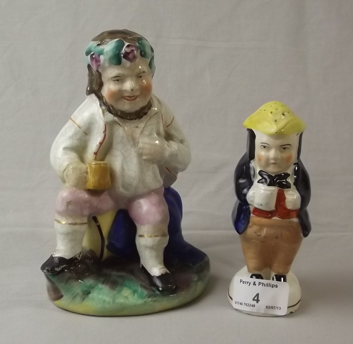 Staffordshire Figure of Man on Barrel and a Staffordshire Sander