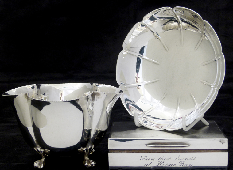 Silver quatrefoil shaped bowl ,Birmingham 1904 , with a millegrain rim, on ball-and-claw feet, width