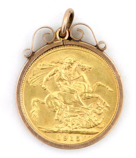 George V gold sovereign , 1915, in a 9ct mount.