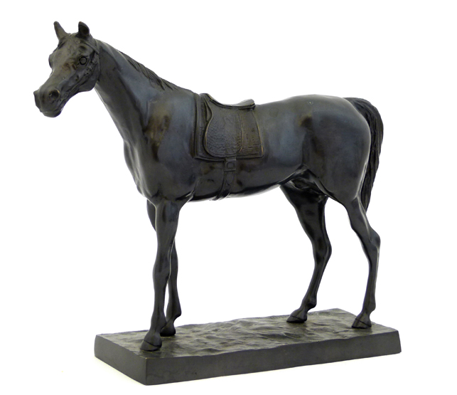 Patinated bronze figure of a saddled race horse , inscribed Korniluk on the rectangular base, height