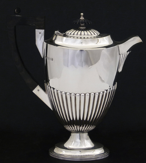 Silver Georgian style hot water jug, Walker & Hall, Sheffield 1964 , of oval section with an