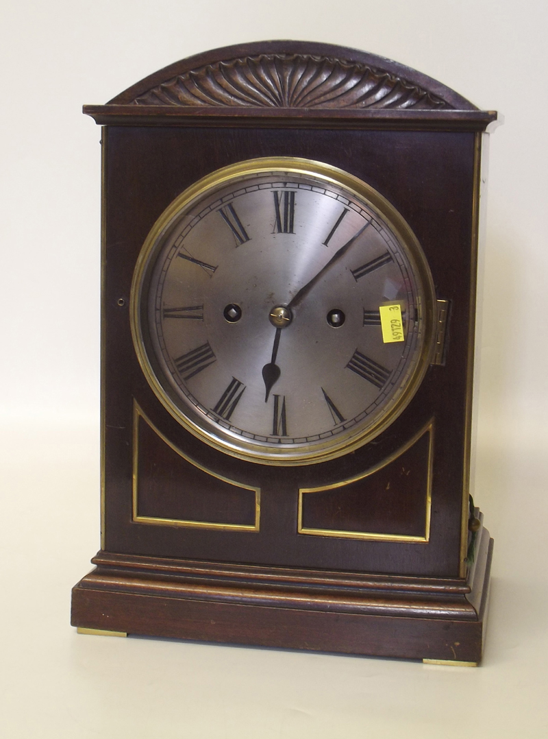 Mahogany cased mantel clock.  Condition report: see terms and conditions