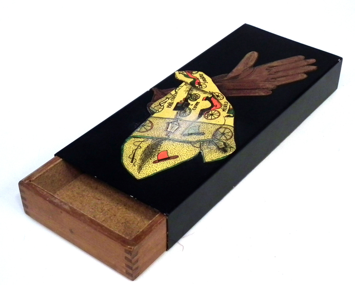 Fornasetti glove box with sliding cedar interior, printed palette mark to red felt base, 30.5cm