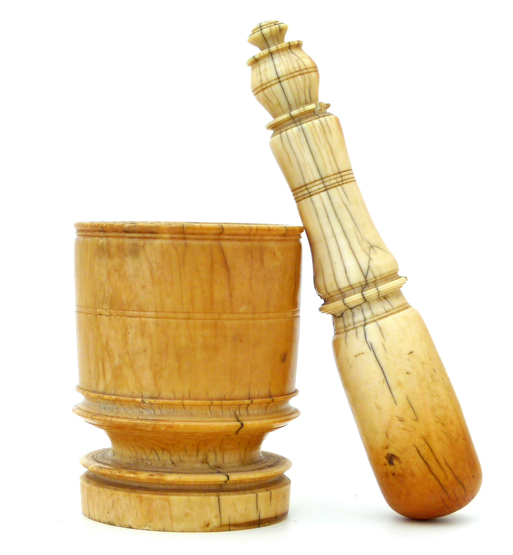 Ivory mortar and pestle , Portuguese 16th or 17th century, the mortar`s somewhat cylindrical ring