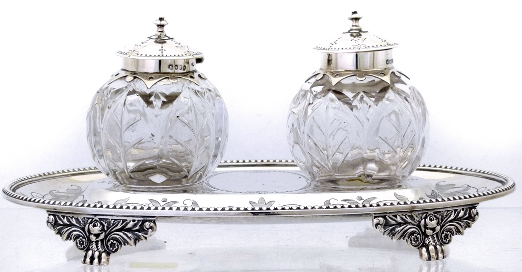Victorian silver inkstand, Thos Smily London 1866 , the oval base engraved with leaf scrolls and set