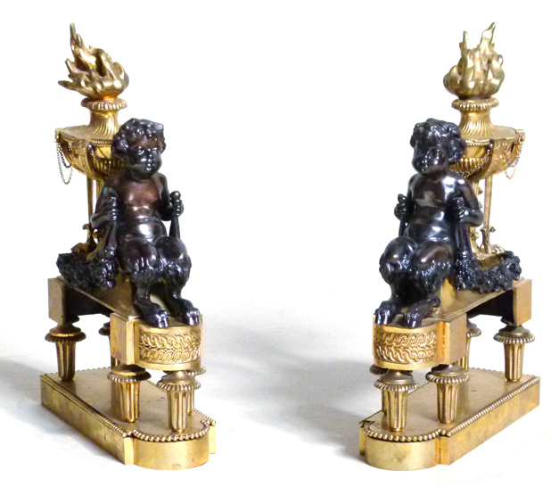 Pair of French Empire style patinated bronze and ormolu chenets , both modelled with a satyr