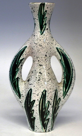 Vallauris vase in Picasso style signed C. Volt, decorated with green leaves on a spotted white
