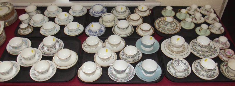Forty seven cups and saucers by Minton and other factories in various patterns.