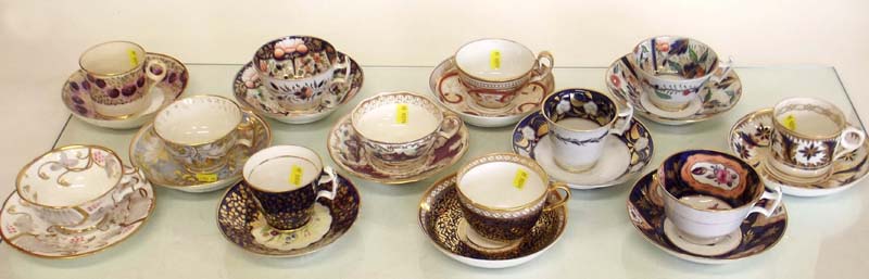 Twelve English porcelain cups and saucers 1800 -1850