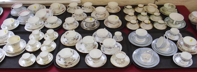 Fifty cups and saucers by Minton and other factories in various patterns.
