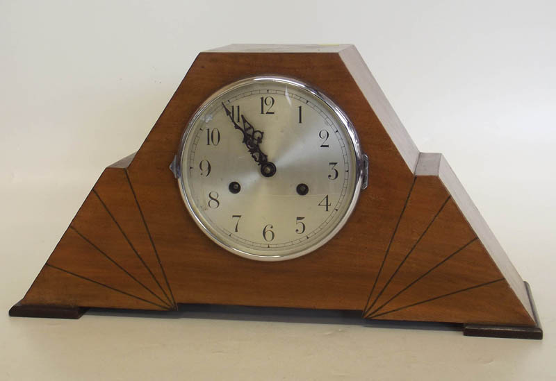 Walnut `sunburst` 8-day mantel clock.