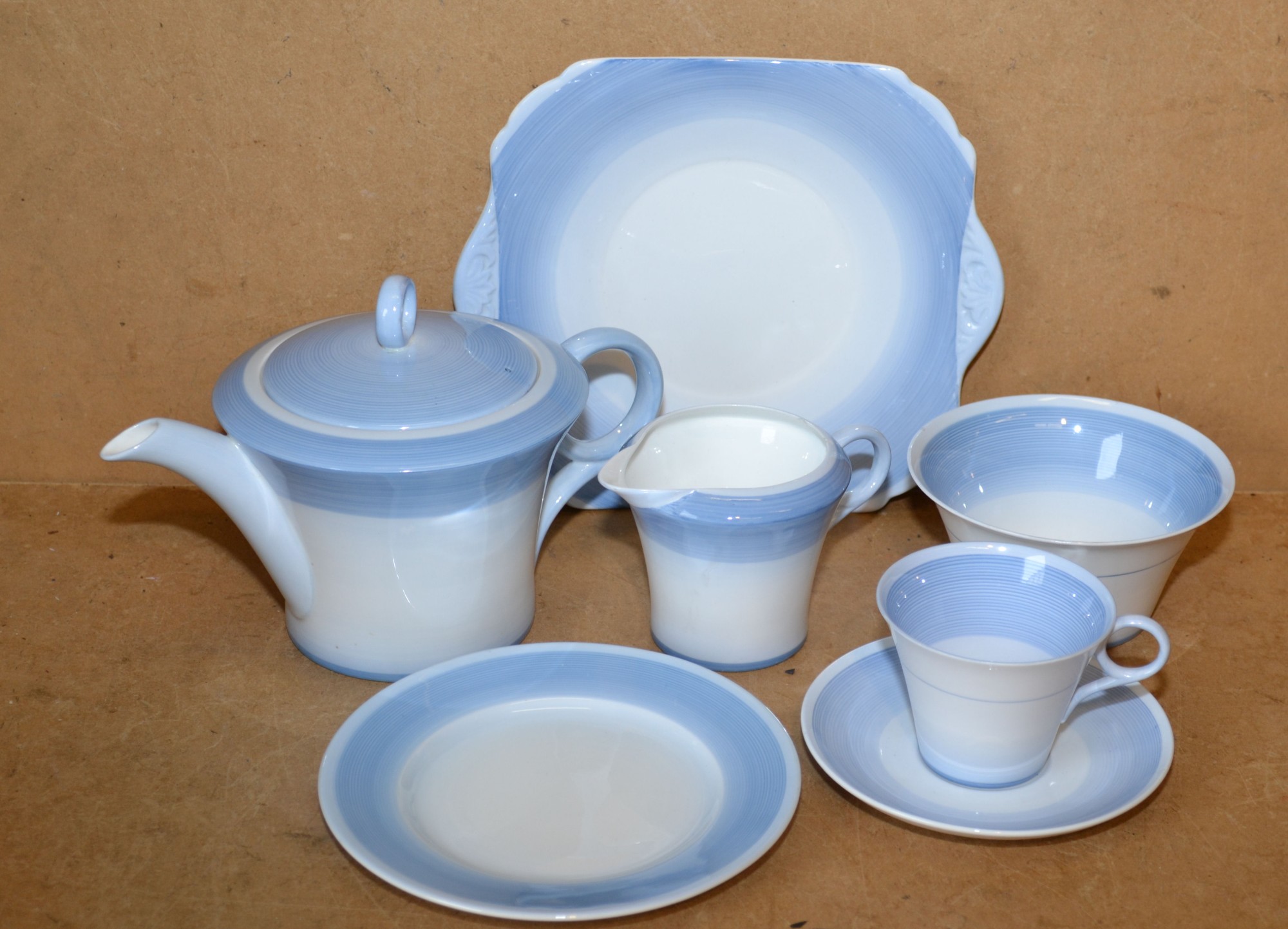 A Shelley Art Deco Blue and White Tea Service having ringed decoration, comprising teapot, milk