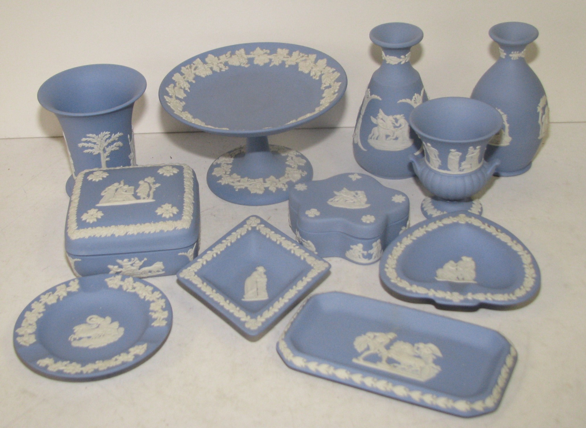 A Wedgwood Jasperware Small Round Comport on blue and white ground with raised grape and vine