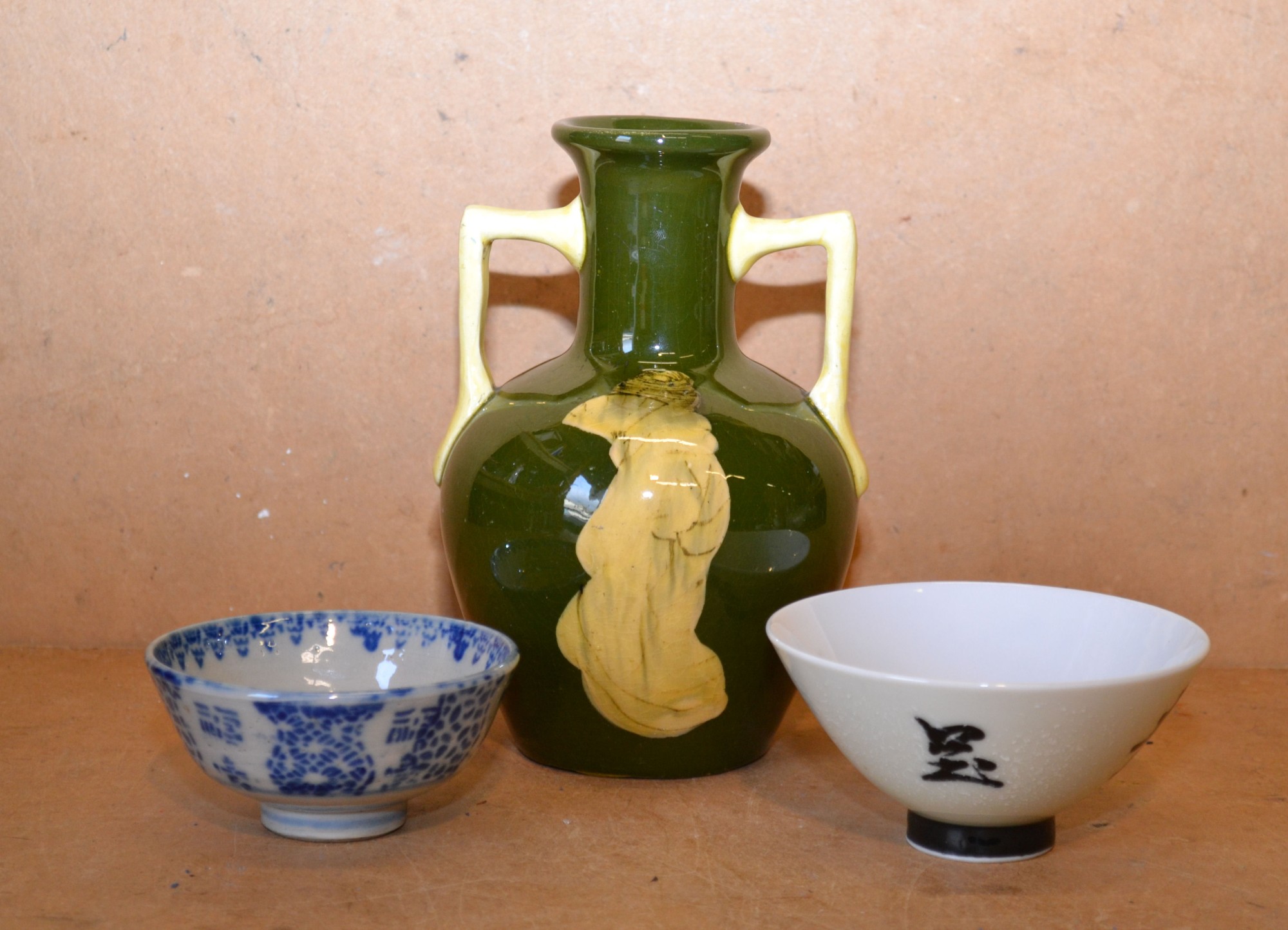 A Glazed Earthenware Bulbous 2-Handled Thin Necked Vase on green and white ground with Oriental