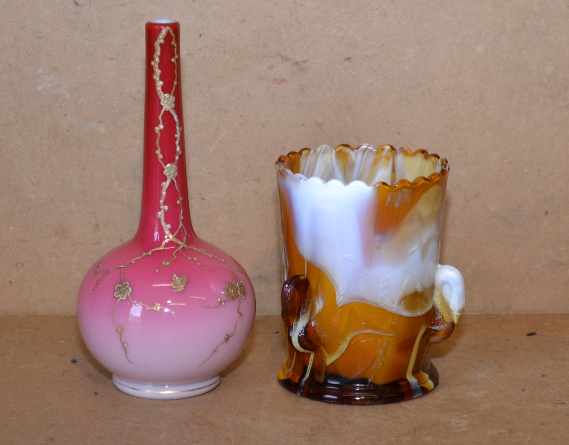 After Thomas Webb, Red and White Opaline Bulbous Thin Necked Vase, having gilt decoration, 18.5cm