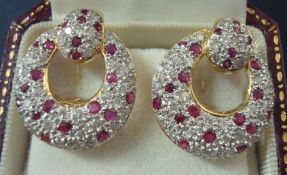 Pair of 14ct ruby and diamond earrings