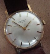 A Gents Longines 9ct gold strap watch, with orignal booklet and box circa 1974