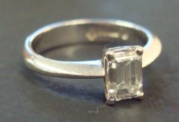 Platinum diamond solitaire ring with emerald cut stone, approx 0.50ct, size K