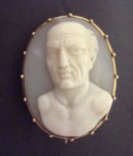 Antique carved agate portrait brooch in yellow metal