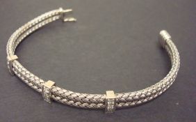 Diamond set bangle in white metal, unmarked, approx 14.6g