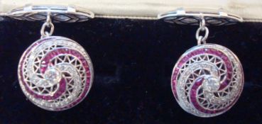 A fine pair of ruby and diamond set cufflinks
