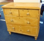 Old pine chest fitted with two short and two long drawers on turned feet
