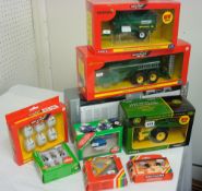 Various Britain`s die cast 1/32 scale models of farmyard machinery including John Deere trailed