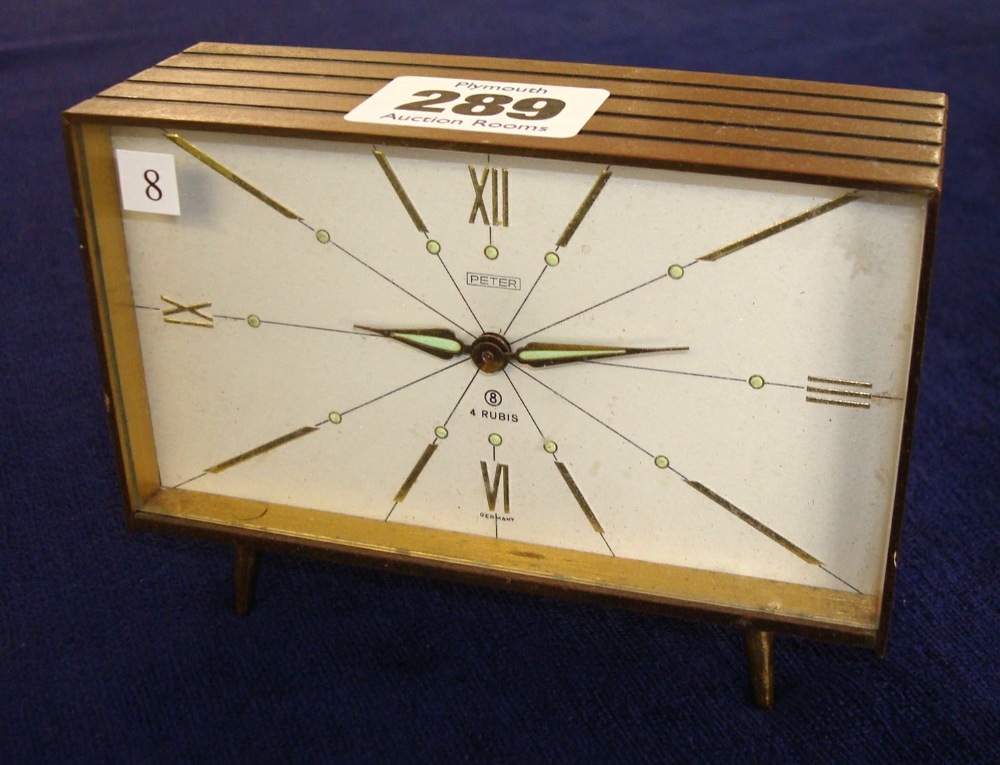 Rectangular cased 8 day clock by Peter of German origin circa 1965, brass case on four pillar