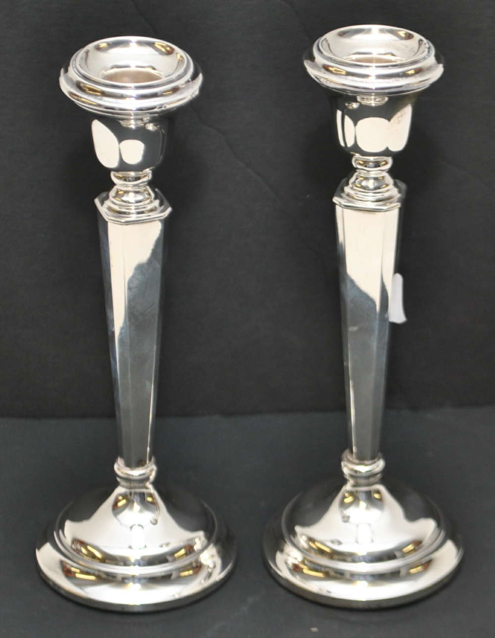 Pair of silver candlesticks, 23cm tall