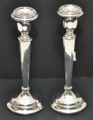 Pair of silver candlesticks, 23cm tall