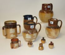 A Royal Doulton stoneware Harvest tyg, together with a collection of other similar Doulton Harvest